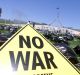 Protests against the Iraq war at Parliament House in Canberra in December 2002.