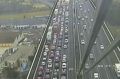 A crash between a truck and motorcycle has closed the West Gate Bridge this morning with traffic diverting at ...