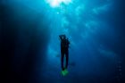 Divers ascending from the deep on Flynn Reef off the coast of Cairns. 