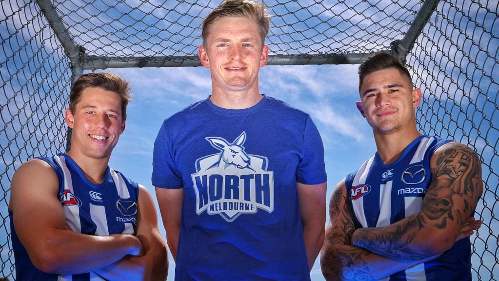 North Melbourne captain Jack Ziebell (middle) with new recruits Nathan Hrovat (left) and Marley Williams (right). Picture: Hamish Blair