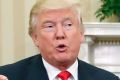 President-elect Donald Trump speaks during his meeting with President Barack Obama in the Oval Office of the White House ...