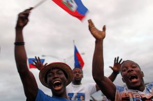 Supporters of presidential candidate Maryse Narcisse rally in Port-au-Prince, Haiti, Friday, Nov. 18, 2016. Sunday's ...