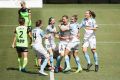 Melbourne City W-League players celebrate after Laura Alleway scores.