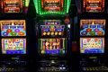 Poker machines stand in the gaming room at the Vikings Club in Canberra, Australia, on Monday, Sept. 26, 2016. Despite ...