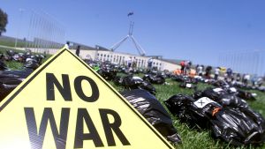 Protests against the Iraq war at Parliament House in Canberra in December 2002.