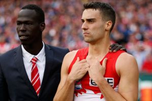 Xavier Richards and Aliir Aliir commiserate after this year's grand final.