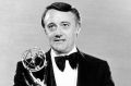 Robert Vaughn poses in 1979 with his Emmy Award for outstanding supporting actor for a drama series in Washington Behind ...