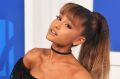 Ariana Grande adds subtle crimping to her famous ponytail style at this year's MTV awards.