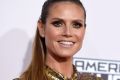 Heidi Klum arrives at the American Music Awards at the Microsoft Theater on Sunday, Nov. 20, 2016, in Los Angeles. ...