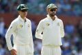 Steeled again: Peter Handscomb and Nathan Lyon in the field on day three