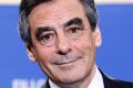 Francois Fillon smiles after delivering a speech after the conservative presidential primary on Sunday.