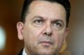 Senator Nick Xenophon addresses the media on his party's deal with the Prime Minister.