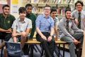 Granville Boys High English teacher, Owen Egan with students taking part in WestWords.