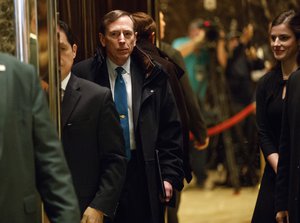 Former CIA director retired Gen. David Petraeus gets on an elevator after arriving at Trump Tower for a meeting with Presiden-elect Donald Trump