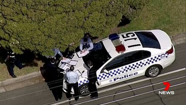 Police at the scene in the Reservoir.