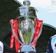 Eyes on the prize: (from left) City coach John van 't Schip and Bruno Fornaroli with Alex Brosque of Sydney FC and his ...