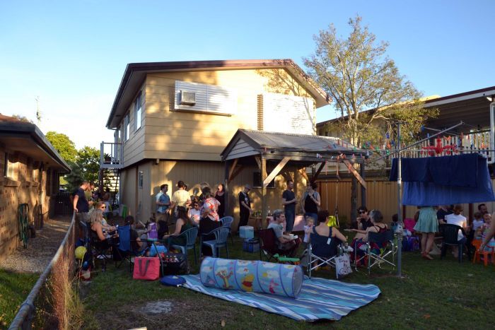 Julian Scharf's backyard full of people attending his party