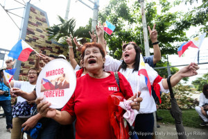 <span>Marcos supporters celebrate outside the Libingan ng mga Bayani during the burial of former Pres. Ferdinand Marcos, November 18, 2016. </span>