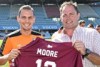 Brisbane Roar captain Jade North holds Maroon jumper alongside Billy Moore