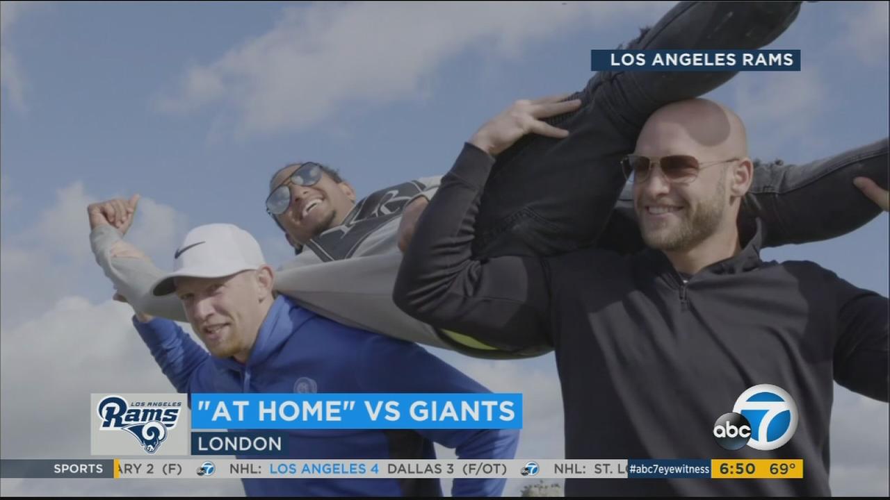 Los Angeles Rams players pose for photos at Stonehenge.