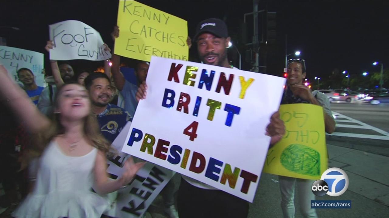 Los Angeles Rams wide receiver Kenny Britt is shown holding a funny sign that says, Kenny Britt for President in Westwood.