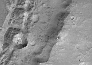 Close-up of the rim of a large unnamed crater north of a crater named Da Vinci, situated near the Mars equator.  The image was taken on 22 November 2016 and is one of the first acquired by the Colour and Stereo Surface Imaging System (CaSSIS) onboard the ExoMars Trace Gas Orbiter.