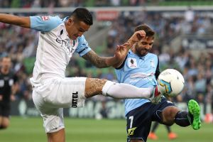MELBOURNE, AUSTRALIA - NOVEMBER 30: Tim Cahill of Melbourne City challenges Michael Zullo of Sydney FC during the FFA ...