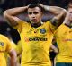 Dejected: Will Genia takes in the Wallabies' missed opportunity.