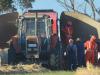 Man trapped in hay baler fights for life