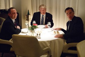 President-elect Donald Trump, center, eats dinner with Mitt Romney, right, and Trump Chief of Staff Reince Priebus at Jean-Georges restaurant, Tuesday, Nov. 29, 2016, in New York.