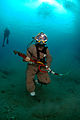 US Navy 080726-N-3093M-015 Lt. Cmdr. Bobby Greene walks across the seabed.jpg