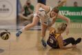 Aimie Clydesdale and Brittany Smart tangle in the race for a loose ball. 