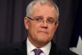 Treasurer Scott Morrison's delays over a return to surplus has Australia's sovereign rating classified as 'on watch' by S&P.