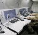 A Ukrainian serviceman inside a surface-to-air missile system.