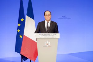 French President Francois Hollande addresses attendees - including U.S. Secretary of State John Kerry and his fellow Foreign Ministers - on June 3, 2016, at the MFA in Convention Center in Paris, France, as he launches a French-sponsored conference focused on Middle East peace effort