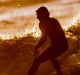 SYDNEY, NEW SOUTH WALES - SEPTEMBER 27: A surfer enjoys a sunrise session at Tamarama beach on September 27, 2016 in ...