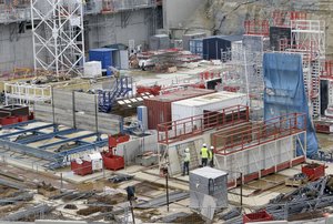 In this picture dated Sept. 15, 2016, workers labor at the construction site of the ITER ( the International Thermonuclear Experimental Reactor) in Saint-Paul-les-Durance, southern France.