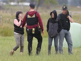 Australian Border Force Raid of asparagus and broccoli farm near Pakenham for illegal workers. They found these workers hiding in long grass in a nearby paddock. Friday, Nov 2. 2016. Picture: David Crosling