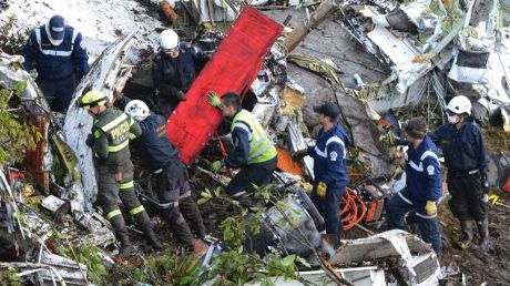 Rescue workers at the crash site south of Medellin in Colombia.