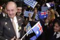 President of Greece Constantine Stephanopoulos meets school children, waving Greek and Australian flags at the Greek ...