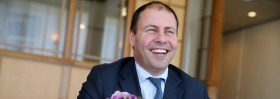 Energy Minister Josh Frydenberg compares the challenges ahead to "Driving down the road in our Tesla and there's more ...