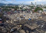 razed to the ground. Over 500 houses are now gone, leaving nearly 3,000 people homeless, following a seven-hour fire that hit this erstwhile densely populated community in Barangay Duljo Fatima, Cebu City, starting at 11:14 p.m. on Thursday, Dec. 1, 2016, until past 6 a.m. the next day. (CDN DRONE PHOTO/TONEE DESPOJO).