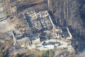 Burned structures are seen from aboard a National Guard helicopter near Gatlinburg, Tenn., on Tuesday, Nov. 29, 2016. (AP Photo/Erik Schelzig)