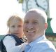 SYDNEY, AUSTRALIA - SEPTEMBER 09: Brad Haddin holds his daughter Mia as poses on the field with his Wife Karina and sons ...