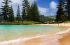 Norfolk Island. With its towering cliffs, tranquil lagoons, soaring tree ferns and pines, this South Pacific island's ...