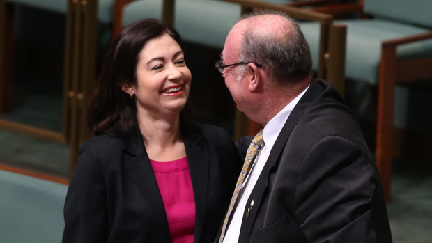 Warren Entsch is embraced by Terri Butler before he introduced a private member's bill on marriage equality Parliament House in Canberra on Monday 17 August 2015. Photo: Andrew Meares