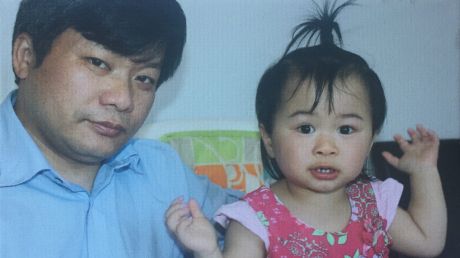 Asthma storm victim Sam Lau with daughter Julia. 