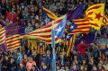 Barcelona's supporters wave Estelada flags during the Spanish La Liga football match between FC Barcelona and Eibar at ...