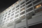 Guests scale building to get to safety as hotel in Karachi, Pakistan goes up in flames. December 5, 2016.