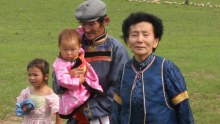 Mongolian mother Sevjid Damdin with her husband Vaani and two grandchildren